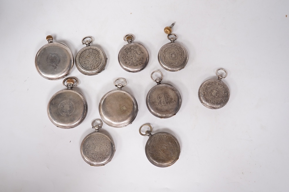 Three early to mid 20th century silver open faced pocket watches, with Roman or Arabic dials and subsidiary seconds, including two keyless and one key wind (Admiral Tacy Watch Co), together with one smaller silver open f